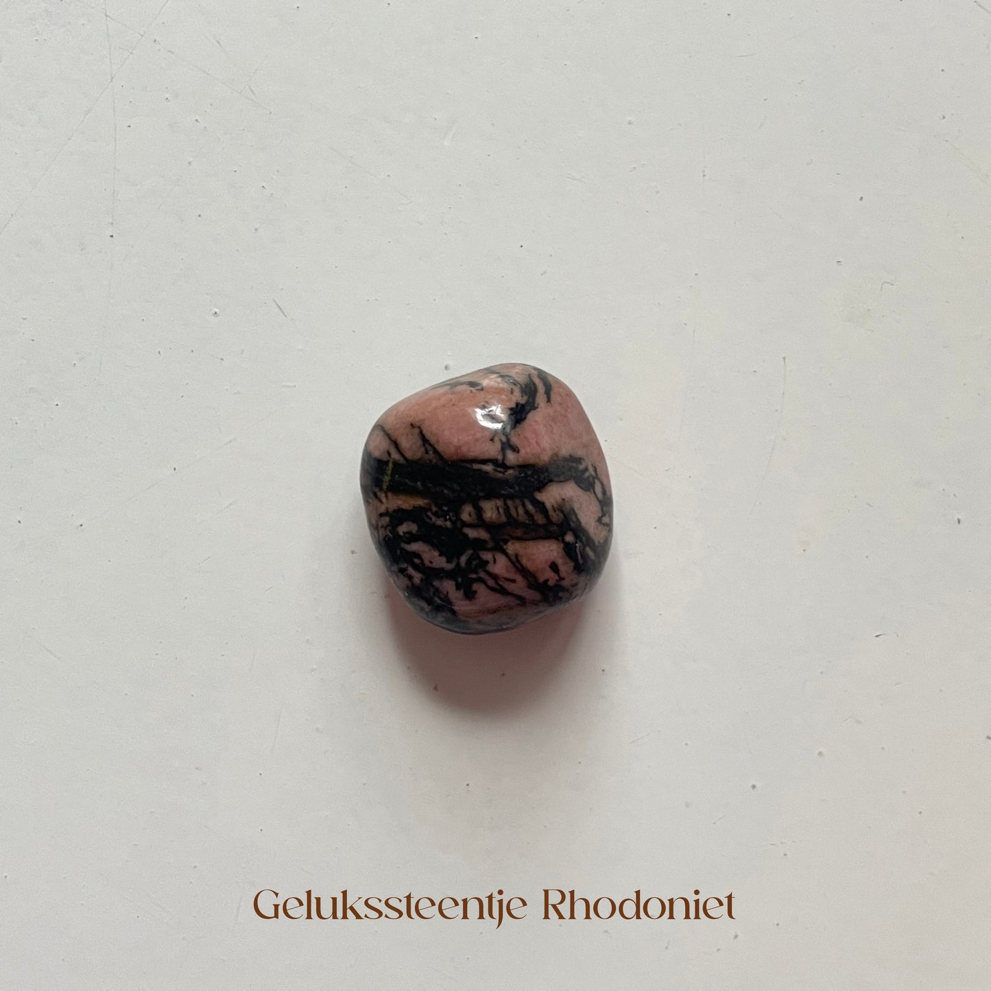 Gelukssteentje Rhodoniet